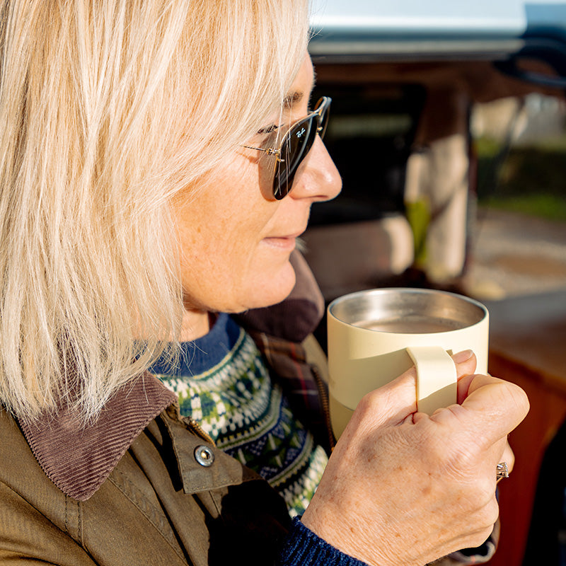 12oz-rise-mug-t6 12oz_rise_coffee_mug_wax_yellow_woman_drink_closeup_square.jpg