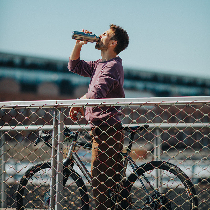 12oz-rise-reflect-with-bamboo-cap-m0 16oz_rise_reflect_man_bike_square.jpg