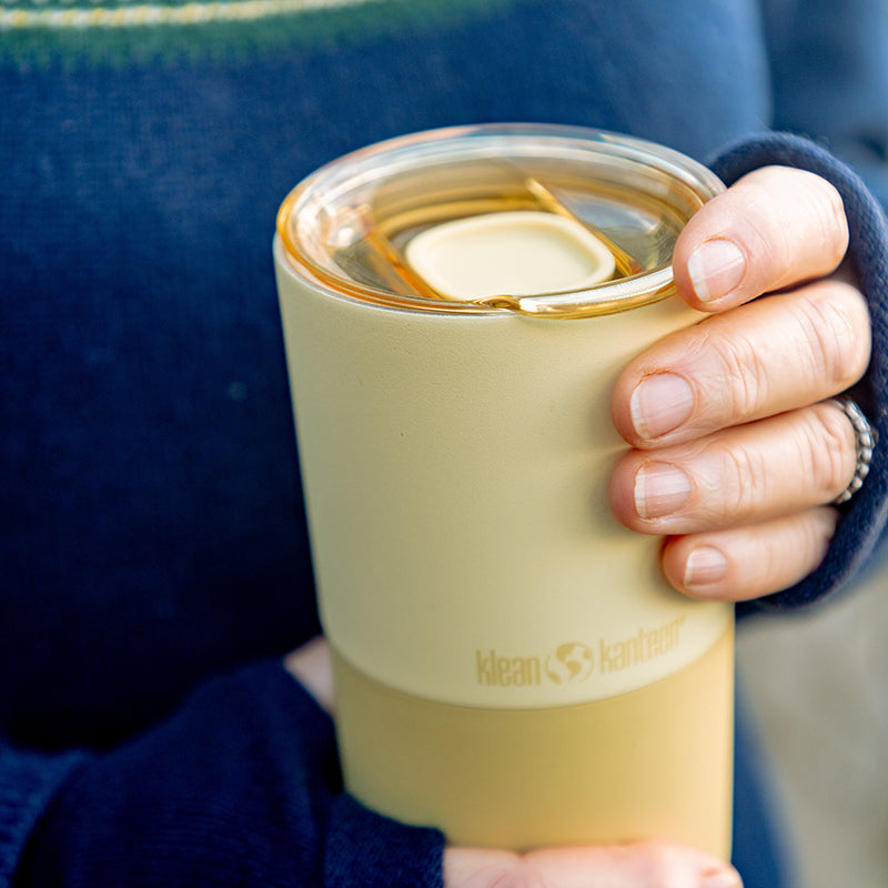 daily-on-the-go-set-k9 16oz_rise_tumbler_wax_yellow_closeup_hand_lid_square.jpg