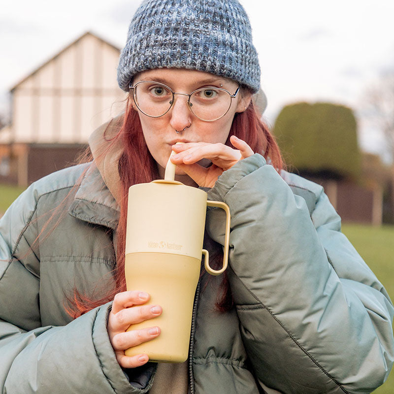 26oz-rise-tumbler-with-straw-lid-j4 26oz_rise_rumbler_straw_wax_yellow_woman_sip_square.jpg