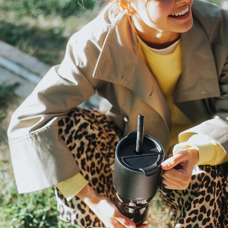 26oz-rise-tumbler-with-straw-lid-j4 26oz_rise_tumbler_black_woman_topview_square.jpg