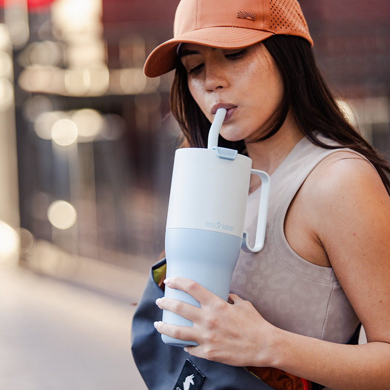 36oz-rise-tumbler-with-straw-lid-g0 36oz_rise_tumbler_straw_girl_sip_square.jpg
