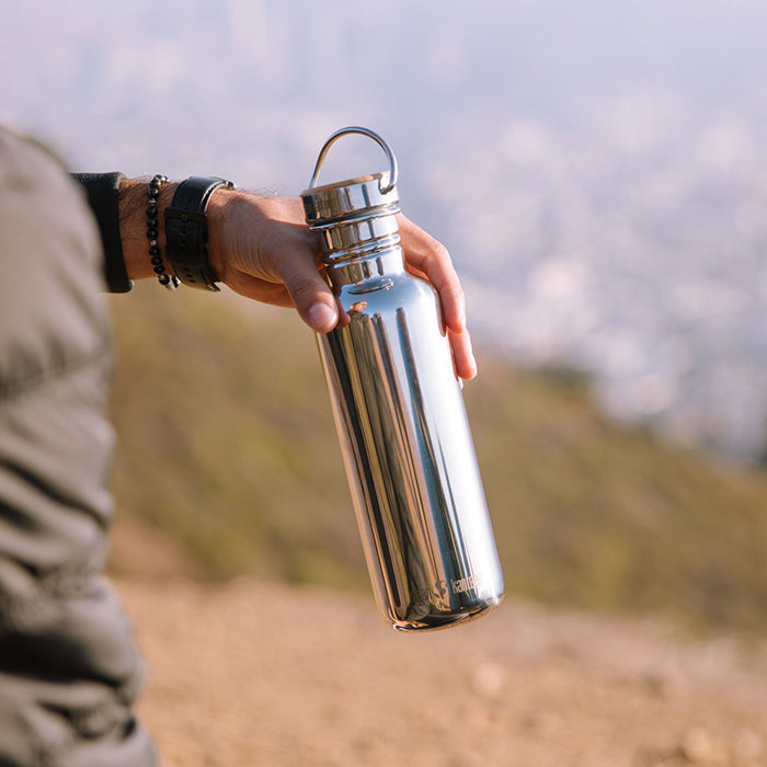 27oz-reflect-with-bamboo-cap-t0 K27SSLRF-MS-BAMBOO_reflect_bottle_hand_lifestyle.jpg