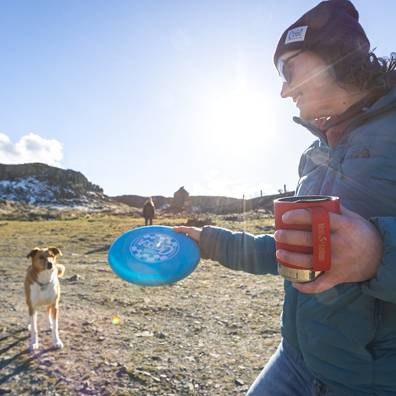 12oz-camp-mug-q5 insulated_camp_mug_12oz_woman_dog_frisbee_square.jpg