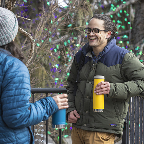 20oz-tkwide-with-cafe-cap-e5 tkwide_20oz_insulated_tumbler_cafe_winter_man_coat_yellow_square.jpg