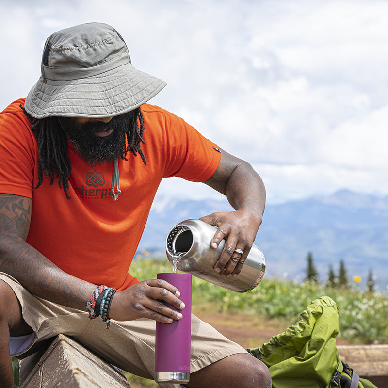 64oz-tkwide-with-loop-cap-d8 tkwide_64oz_bottle_backpacker_mountains_filling_square.jpg